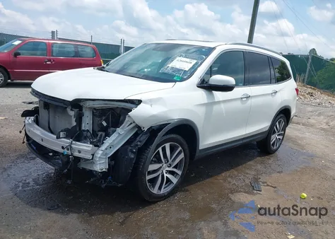 2018 Honda Pilot Touring из США, поврежденный, VIN 5FNYF6H91JB028626